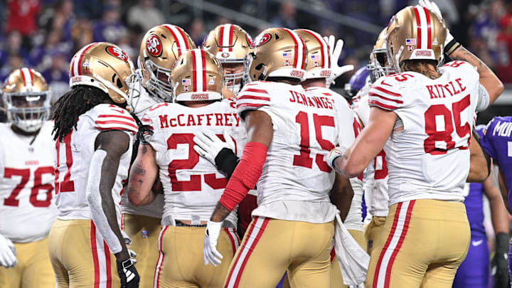 Oct 23, 2023; Minneapolis, Minnesota, USA; San Francisco 49ers running back Christian McCaffrey (23) and wide receiver Jauan Jennings (15) and tight end George Kittle (85) react with teammates during the game against the Minnesota Vikings at U.S. Bank Stadium. Mandatory Credit: Jeffrey Becker-Imagn Images Oct 23, 2023; Minneapolis, Minnesota, USA; San Francisco 49ers running back Christian McCaffrey (23) and wide receiver Jauan Jennings (15) and tight end George Kittle (85) react with teammates during the game against the Minnesota Vikings at U.S. Bank Stadium. Mandatory Credit: Jeffrey Becker-Imagn Images