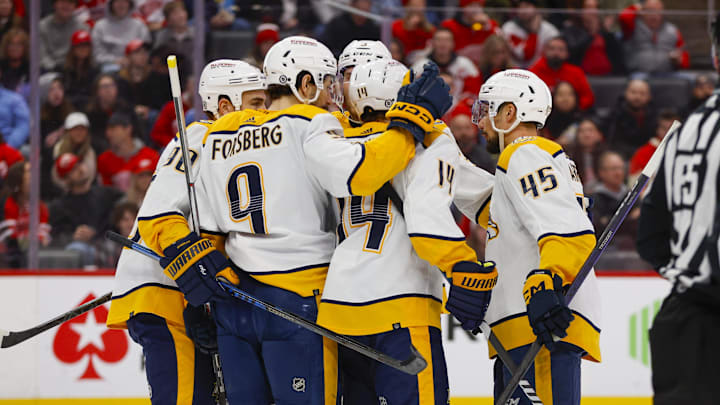 Dec 29, 2023; Detroit, Michigan, USA; The Nashville Predators celebrate a goal by Nashville
