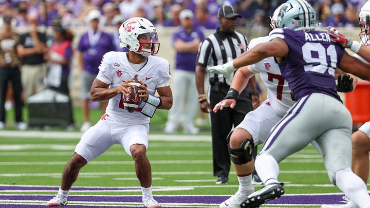 Washington State Cougars quarterback Caden Pinnick (12) drops back to pass during the first quarter against the Kansas State Wildcats at Bill Snyder Family Football Stadium. Washington State Cougars quarterback Caden Pinnick (12) drops back to pass during the first quarter against the Kansas State Wildcats at Bill Snyder Family Football Stadium.
