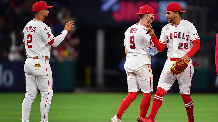 Jun 23, 2026; Anaheim, California, USA; Los Angeles Angels second baseman Oswald Peraza (2) shortstop Zach Neto (9) and left fielder Jose Siri (28) celebrate the victory against the Baltimore Orioles at Angel Stadium. Mandatory Credit: Gary A. Vasquez-Imagn Images