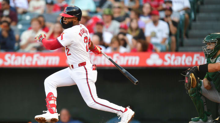 Jul 26, 2024; Anaheim, California, USA; Los Angeles Angels second baseman Luis Rengifo (2) hits a single against the Oakland Athletics during the first inning at Angel Stadium. Mandatory Credit: Gary A. Vasquez-USA TODAY Sports