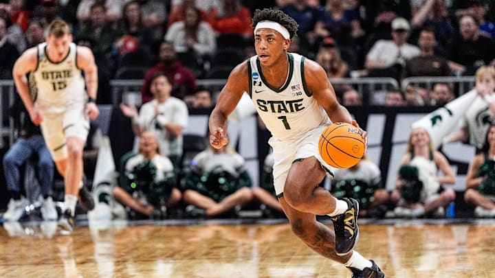 Michigan State guard Jeremy Fears Jr. (1) dribbles against Ole Miss during the first half of the Sweet 16 round of NCAA tournament at State Farm Arena in Atlanta, Ga. on Friday, March 28, 2025.
