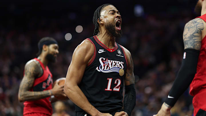 Nov 8, 2025; Philadelphia, Pennsylvania, USA; Philadelphia 76ers forward Trendon Watford (12) reacts after a score and foul against the Toronto Raptors during the first quarter at Xfinity Mobile Arena. Mandatory Credit: Bill Streicher-Imagn Images Nov 8, 2025; Philadelphia, Pennsylvania, USA; Philadelphia 76ers forward Trendon Watford (12) reacts after a score and foul against the Toronto Raptors during the first quarter at Xfinity Mobile Arena. Mandatory Credit: Bill Streicher-Imagn Images