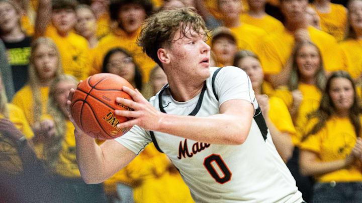 Madrid's Jevyn Severson (0) keeps the ball inbounds during the boys Class 1A state quarterfinal against Boyden Hull on Wednesday, March 12, 2025, at Wells Fargo Arena in Des Moines. Madrid's Jevyn Severson (0) keeps the ball inbounds during the boys Class 1A state quarterfinal against Boyden Hull on Wednesday, March 12, 2025, at Wells Fargo Arena in Des Moines.