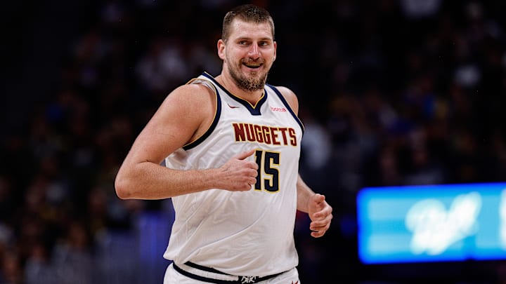 Oct 13, 2024; Denver, Colorado, USA; Denver Nuggets center Nikola Jokic (15) reacts after a play in the second quarter against the Phoenix Suns at Ball Arena. Mandatory Credit: Isaiah J. Downing-Imagn Images