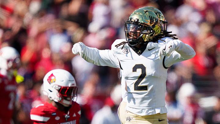 Sep 26, 2026; Louisville, Kentucky, USA; Wake Forest Demon Deacons defensive back Deuce Blades Ii (2) celebrates after a successful block against Louisville Cardinals running back Isaac Brown (1) during the fourth quarter against the Louisville Cardinals at L&N Federal Credit Union Stadium. Mandatory Credit: Chris Carter-Imagn Images Sep 26, 2026; Louisville, Kentucky, USA; Wake Forest Demon Deacons defensive back Deuce Blades Ii (2) celebrates after a successful block against Louisville Cardinals running back Isaac Brown (1) during the fourth quarter against the Louisville Cardinals at L&N Federal Credit Union Stadium. Mandatory Credit: Chris Carter-Imagn Images