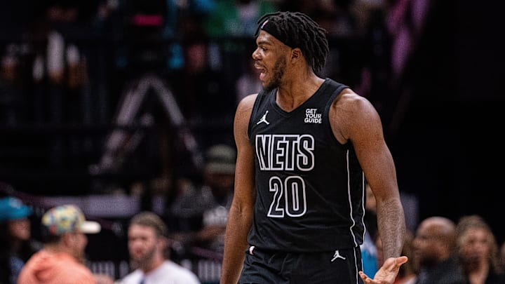 Mar 8, 2025; Charlotte, North Carolina, USA; Brooklyn Nets center Day'Ron Sharpe (20) argues for a foul during the third quarter against the Charlotte Hornets at Spectrum Center. Mandatory Credit: Scott Kinser-Imagn Images