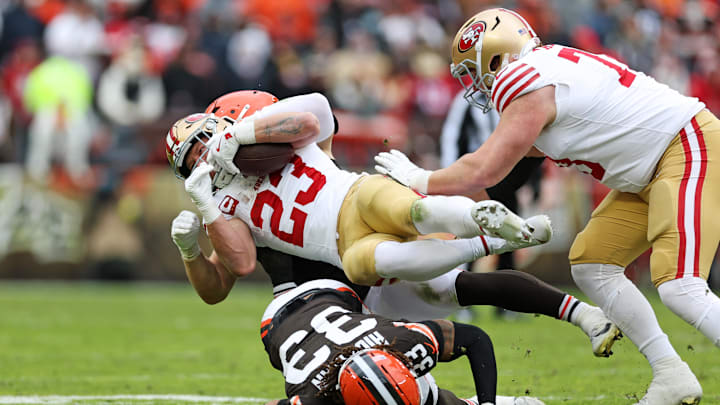 Nov 30, 2025; Cleveland, Ohio, USA; San Francisco 49ers running back Christian McCaffrey (23) is tackled by Cleveland Browns safety Ronnie Hickman (33) during the first half at Huntington Bank Field. Mandatory Credit: Scott Galvin-Imagn Images Nov 30, 2025; Cleveland, Ohio, USA; San Francisco 49ers running back Christian McCaffrey (23) is tackled by Cleveland Browns safety Ronnie Hickman (33) during the first half at Huntington Bank Field. Mandatory Credit: Scott Galvin-Imagn Images