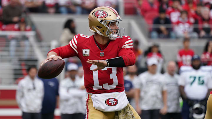 Nov 17, 2024; Santa Clara, California, USA; San Francisco 49ers quarterback Brock Purdy (13) throws a pass against the Seattle Seahawks in the second quarter at Levi's Stadium. Mandatory Credit: David Gonzales-Imagn Images