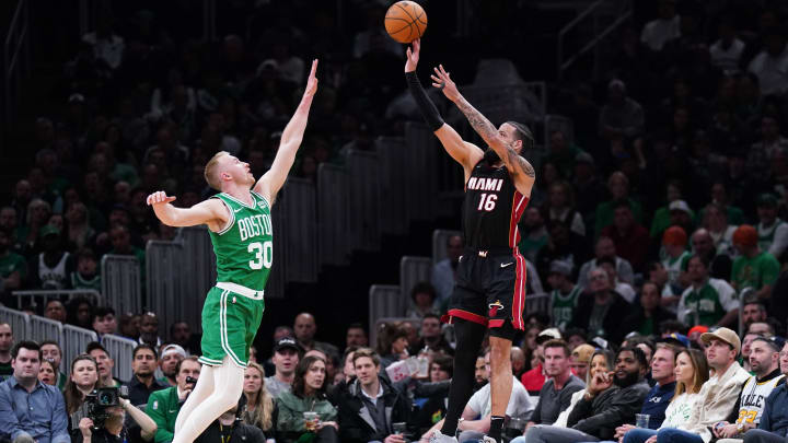 Apr 24, 2024; Boston, Massachusetts, USA; Miami Heat forward Caleb Martin (16) shoots for three points against Boston Celtics forward Sam Hauser (30) in the second quarter during game two of the first round for the 2024 NBA playoffs at TD Garden. Mandatory Credit: David Butler II-USA TODAY Sports Apr 24, 2024; Boston, Massachusetts, USA; Miami Heat forward Caleb Martin (16) shoots for three points against Boston Celtics forward Sam Hauser (30) in the second quarter during game two of the first round for the 2024 NBA playoffs at TD Garden. Mandatory Credit: David Butler II-USA TODAY Sports