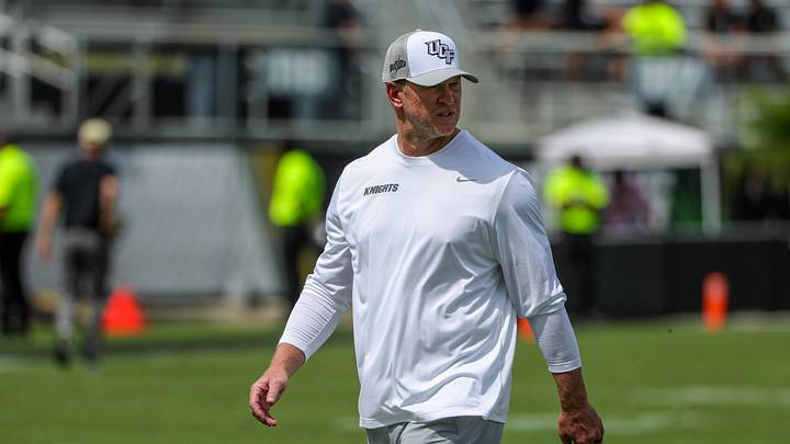 Sep 20, 2025; Orlando, Florida, USA; UCF Knights head coach Scott Frost looks on during warmups before the game against the North Carolina Tar Heels at the Bounce House Stadium. Mandatory Credit: Mike Watters-Imagn Images Sep 20, 2025; Orlando, Florida, USA; UCF Knights head coach Scott Frost looks on during warmups before the game against the North Carolina Tar Heels at the Bounce House Stadium. Mandatory Credit: Mike Watters-Imagn Images