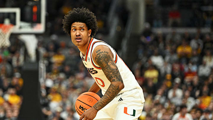 Mar 20, 2026; St. Louis, MO, USA; Miami (FL) Hurricanes guard Tru Washington (10) looks to pass during the first half against the Missouri Tigers during a first round game of the men's 2026 NCAA Tournament at Enterprise Center. Mandatory Credit: Jeff Le-Imagn Images Mar 20, 2026; St. Louis, MO, USA; Miami (FL) Hurricanes guard Tru Washington (10) looks to pass during the first half against the Missouri Tigers during a first round game of the men's 2026 NCAA Tournament at Enterprise Center. Mandatory Credit: Jeff Le-Imagn Images