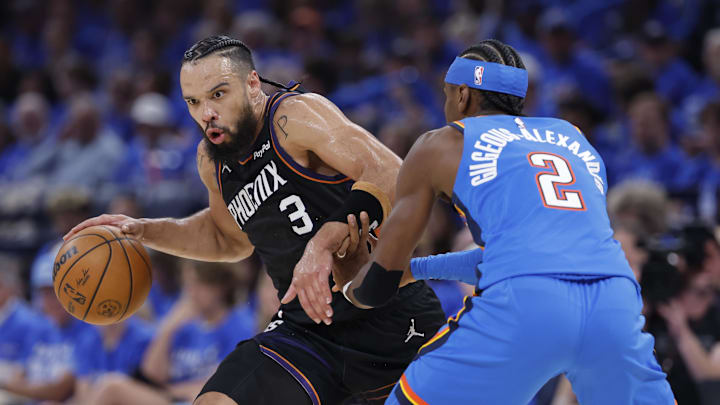 Apr 19, 2026; Oklahoma City, Oklahoma, USA; Phoenix Suns forward Dillon Brooks (3) drives around Oklahoma City Thunder guard Shai Gilgeous-Alexander (2) in the second quarter during game one of the first round of the 2026 NBA Playoffs at Paycom Center. Mandatory Credit: Alonzo Adams-Imagn Images