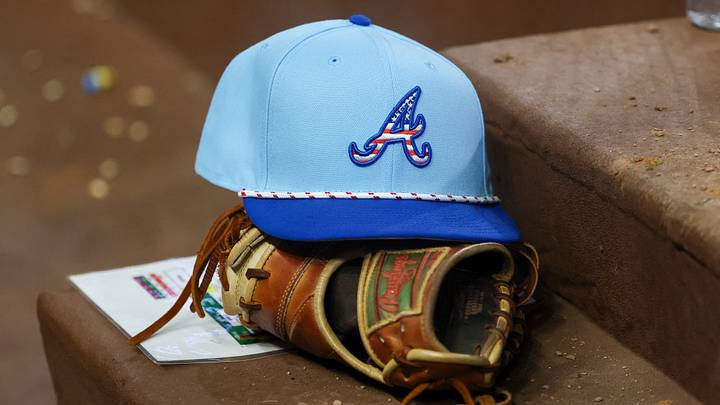 Jul 4, 2025; Atlanta, Georgia, USA; A detailed view of the Atlanta Braves 4th of July hat in the dugout against the Baltimore Orioles in the seventh inning at Truist Park. Mandatory Credit: Brett Davis-Imagn Images Jul 4, 2025; Atlanta, Georgia, USA; A detailed view of the Atlanta Braves 4th of July hat in the dugout against the Baltimore Orioles in the seventh inning at Truist Park. Mandatory Credit: Brett Davis-Imagn Images