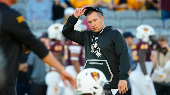 ASU head coach Kenny Dillingham watches his team warm up prior to a game against UCF at Mountain America Stadium in Tempe on Nov. 9, 2024.