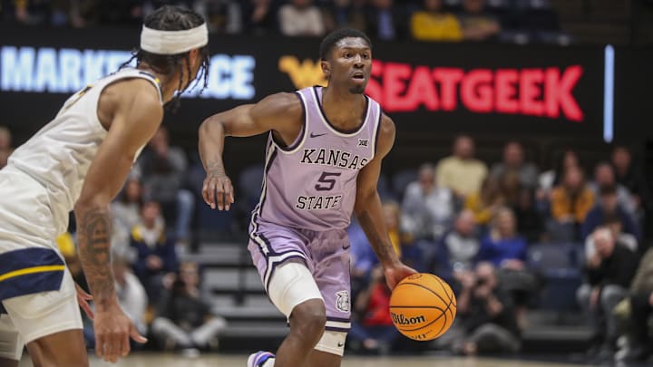 Jan 9, 2024; Morgantown, West Virginia, USA; Kansas State Wildcats guard Cam Carter (5) looks to get the Wildcats offense setup.