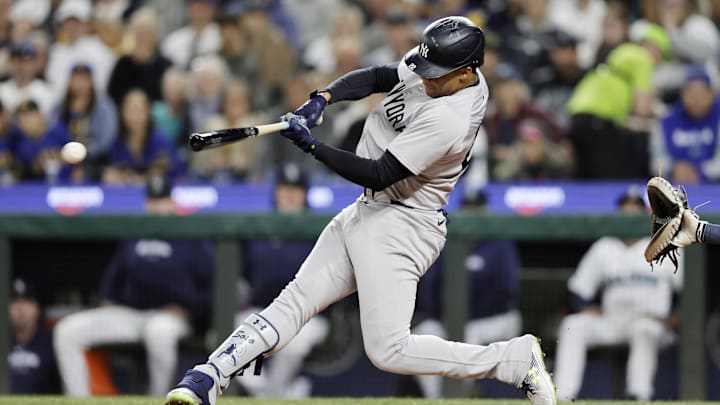 Sep 18, 2024; Seattle, Washington, USA; New York Yankees right fielder Juan Soto (22) hits a double against the Seattle Mariners during the third inning at T-Mobile Park. Mandatory Credit: John Froschauer-Imagn Images