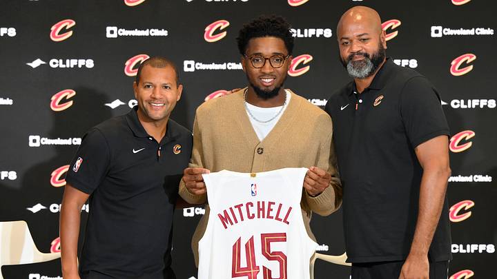 Sep 14, 2022; Cleveland, OH, USA; Cleveland Cavaliers guard Donovan Mitchell (center) poses with team president of basketball operations Koby Altman (left) and head coach J.B. Bickerstaff during an introductory press conference at Rocket Mortgage FieldHouse. Mandatory Credit: David Richard-USA TODAY Sports