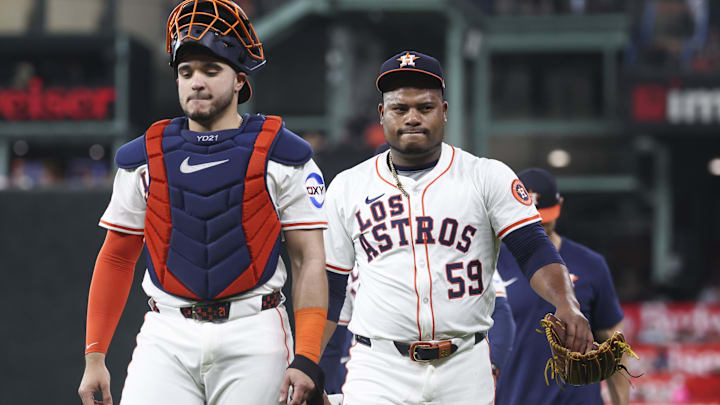 Sep 20, 2025; Houston, Texas, USA; Houston Astros starting pitcher Framber Valdez (59) walks on the field with catcher Yainer Diaz (21) before the game against the Seattle Mariners at Daikin Park. Mandatory Credit: Troy Taormina-Imagn Images