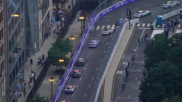 Jul 2, 2023; Chicago, Illinois, USA; A general view as cars race along Grant Park during the Grant Park 220 of the Chicago Street Race viewed from the eRacing Association turn 7 Skydeck at Venue Six10. Mandatory Credit: Jon Durr-Imagn Images