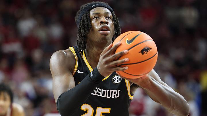 Feb 22, 2025; Fayetteville, Arkansas, USA; Missouri Tigers forward Mark Mitchell (25) shoots a free throw during the second half against the Arkansas Razorbacks at Bud Walton Arena. Mandatory Credit: Nelson Chenault-Imagn Images Feb 22, 2025; Fayetteville, Arkansas, USA; Missouri Tigers forward Mark Mitchell (25) shoots a free throw during the second half against the Arkansas Razorbacks at Bud Walton Arena. Mandatory Credit: Nelson Chenault-Imagn Images