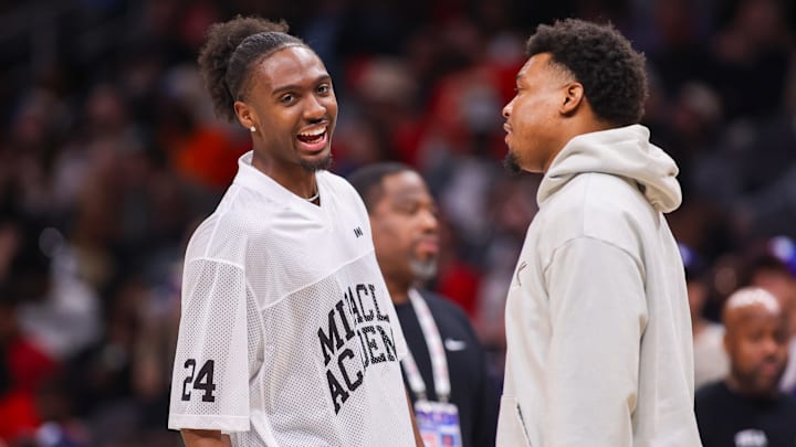 Mar 23, 2025; Atlanta, Georgia, USA; Philadelphia 76ers guard Tyrese Maxey (0) talks to guard Kyle Lowry (7) during a timeout against the Atlanta Hawks in the second quarter at State Farm Arena. Mandatory Credit: Brett Davis-Imagn Images Mar 23, 2025; Atlanta, Georgia, USA; Philadelphia 76ers guard Tyrese Maxey (0) talks to guard Kyle Lowry (7) during a timeout against the Atlanta Hawks in the second quarter at State Farm Arena. Mandatory Credit: Brett Davis-Imagn Images