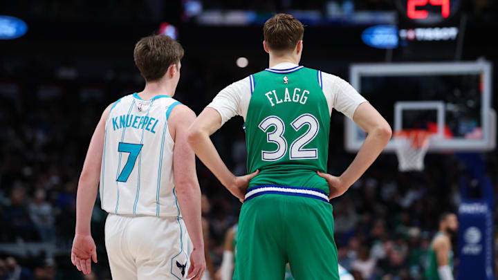 Jan 29, 2026; Dallas, Texas, USA;  Charlotte Hornets guard Kon Knueppel (7) stands with Dallas Mavericks forward Cooper Flagg (32) during the second half at American Airlines Center. Mandatory Credit: Kevin Jairaj-Imagn Images