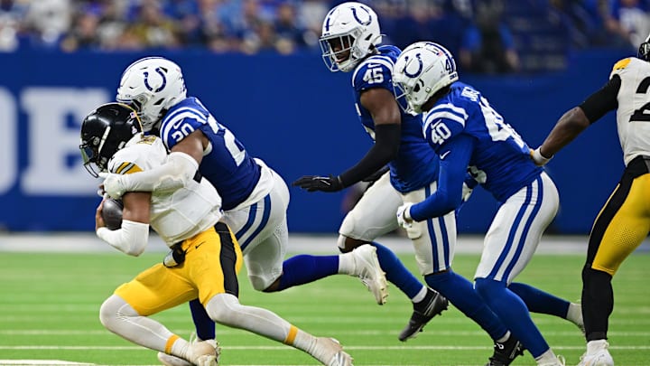 Sep 29, 2024; Indianapolis, Indiana, USA; Indianapolis Colts safety Nick Cross (20) sacks Pittsburgh Steelers quarterback Justin Fields (2) during the second half at Lucas Oil Stadium. Mandatory Credit: Marc Lebryk-Imagn Images