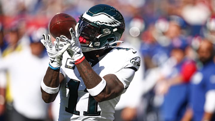 Oct 20, 2024; East Rutherford, New Jersey, USA; Philadelphia Eagles wide receiver A.J. Brown (11) catches the ball a touchdown pass during the first half against the New York Giants at MetLife Stadium. Mandatory Credit: Vincent Carchietta-Imagn Images