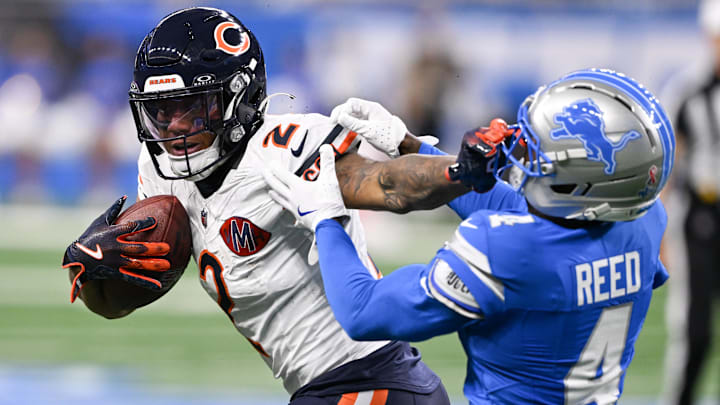 Chicago Bears wide receiver DJ Moore (2) carries the ball defended by Detroit Lions cornerback D.J. Reed (4) during the first quarter of the game at Ford Field.