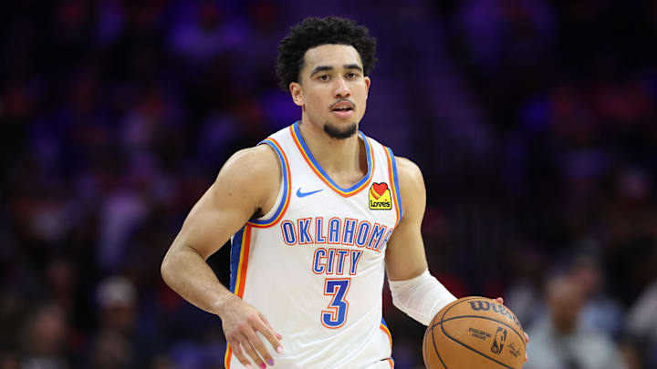 Mar 23, 2026; Philadelphia, Pennsylvania, USA; Oklahoma City Thunder guard Jared McCain (3) dribbles the ball against the Philadelphia 76ers during the fourth quarter at Xfinity Mobile Arena. Mandatory Credit: Bill Streicher-Imagn Images