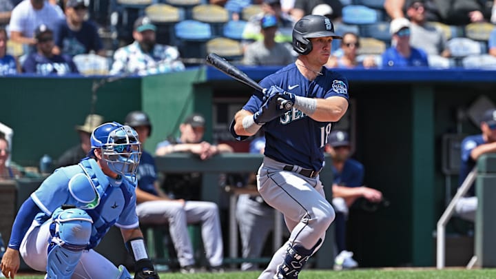 Aug 17, 2023; Kansas City, Missouri, USA;  Seattle Mariners left fielder Cade Marlowe (18) singles in the second inning against the Kansas City Royals at Kauffman Stadium. Mandatory Credit: Peter Aiken-Imagn Images