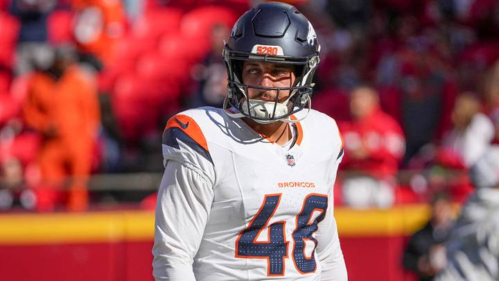 Denver Broncos long snapper Mitchell Fraboni (48) warms up against the Kansas City Chiefs prior to a game at GEHA Field at Arrowhead Stadium. 