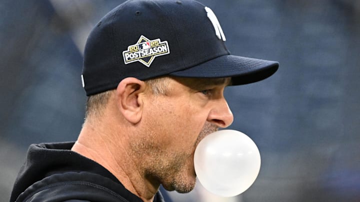 Oct 3, 2025; Toronto, Ontario, Canada;  New York Yankees manager Aaron Boone (17) watches his players during workouts at Rogers Centre. Mandatory Credit: Dan Hamilton-Imagn Images