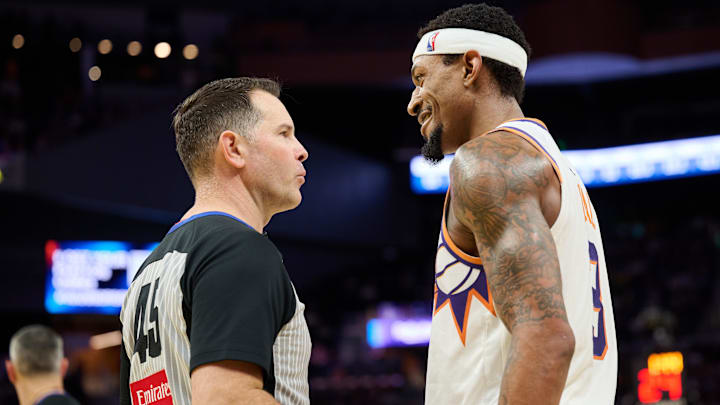 Dec 28, 2024; San Francisco, California, USA; Phoenix Suns guard Bradley Beal (3) talks with referee Brian Forte (45) during the fourth quarter at Chase Center. Mandatory Credit: Robert Edwards-Imagn Images