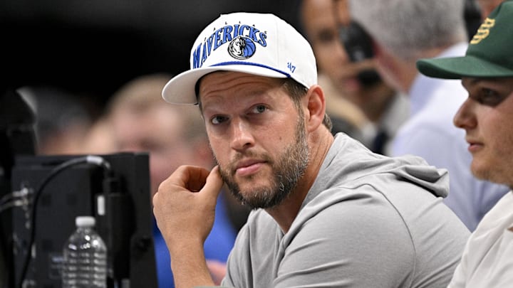 Nov 19, 2025; Dallas, Texas, USA; Los Angeles Dodgers pitcher Clayton Kershaw looks on during the second quarter between the Dallas Mavericks and the New York Knicks at the American Airlines Center. Mandatory Credit: Jerome Miron-Imagn Images