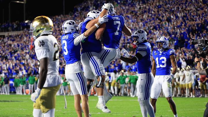Oct 17, 2026; Provo, Utah, USA; Brigham Young Cougars tight end Walker Lyons (7) celebrates with teammates after scoring a touchdown against the Notre Dame Fighting Irish during the second half at LaVell Edwards Stadium. Mandatory Credit: Rob Gray-Imagn Images Oct 17, 2026; Provo, Utah, USA; Brigham Young Cougars tight end Walker Lyons (7) celebrates with teammates after scoring a touchdown against the Notre Dame Fighting Irish during the second half at LaVell Edwards Stadium. Mandatory Credit: Rob Gray-Imagn Images