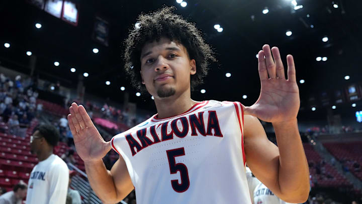 Mar 22, 2026; San Diego, CA, USA; Arizona Wildcats guard Brayden Burries (5) celebrates after defeating the Utah State Aggies during a second round game of the men's 2026 NCAA Tournament at Viejas Arena. Mandatory Credit: Kirby Lee-Imagn Images Mar 22, 2026; San Diego, CA, USA; Arizona Wildcats guard Brayden Burries (5) celebrates after defeating the Utah State Aggies during a second round game of the men's 2026 NCAA Tournament at Viejas Arena. Mandatory Credit: Kirby Lee-Imagn Images