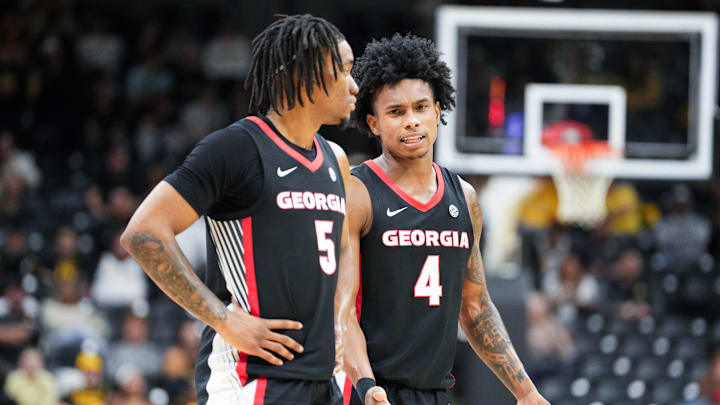 Jan 20, 2026; Columbia, Missouri, USA; Georgia Bulldogs guard Jeremiah Wilkinson (5) talks with guard Marcus Millender (4) against the Missouri Tigers during the second half of the game at Mizzou Arena. Mandatory Credit: Denny Medley-Imagn Images Jan 20, 2026; Columbia, Missouri, USA; Georgia Bulldogs guard Jeremiah Wilkinson (5) talks with guard Marcus Millender (4) against the Missouri Tigers during the second half of the game at Mizzou Arena. Mandatory Credit: Denny Medley-Imagn Images