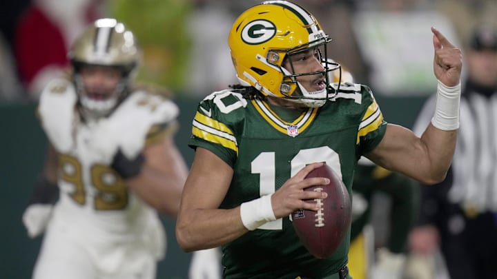 Green Bay Packers quarterback Jordan Love (10) directs a receiver during the first quarter of their game Monday, December 23, 2024 at Lambeau Field in Green Bay, Wisconsin. The Green Bay Packers beat the New Orleans Saints 34-0.
