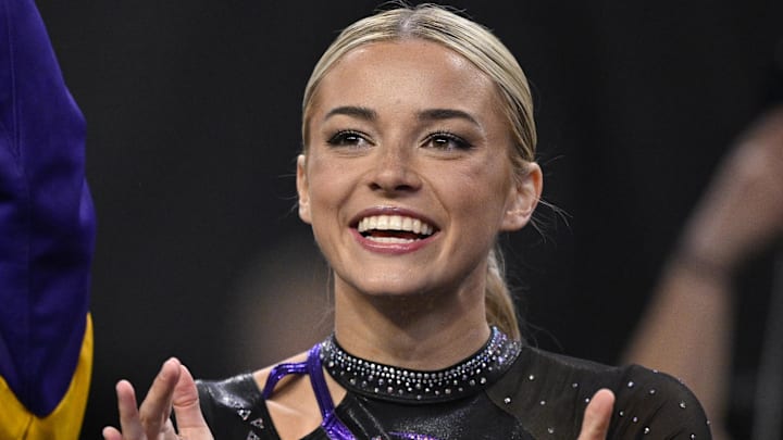 Former LSU Tigers gymnast Livvy Dunne cheers for the LSU gymnastic team during the 2025 Women's National Gymnastics Semifinal at Dickies Arena.