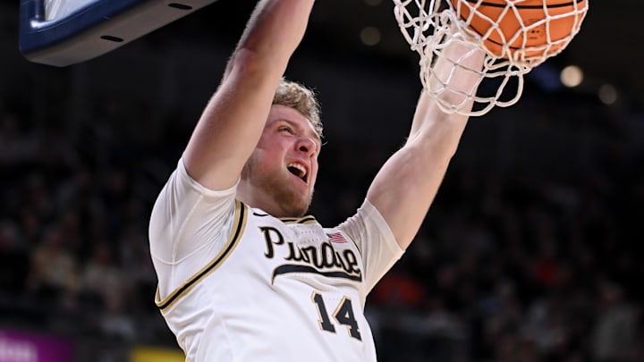 Purdue Boilermakers guard Jack Benter (14) dunks the ball 