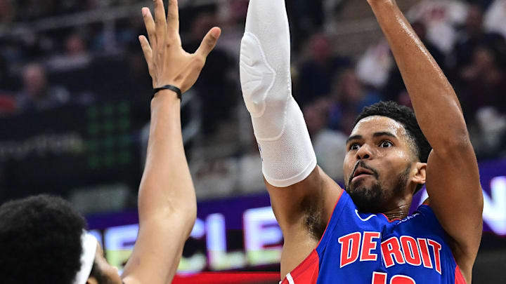 Oct 25, 2024; Cleveland, Ohio, USA; Detroit Pistons forward Tobias Harris (12) shoots over the defense of Cleveland Cavaliers center Jarrett Allen (31) during the first quarter at Rocket Mortgage FieldHouse. Mandatory Credit: Ken Blaze-Imagn Images Oct 25, 2024; Cleveland, Ohio, USA; Detroit Pistons forward Tobias Harris (12) shoots over the defense of Cleveland Cavaliers center Jarrett Allen (31) during the first quarter at Rocket Mortgage FieldHouse. Mandatory Credit: Ken Blaze-Imagn Images