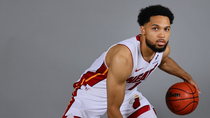 Sep 30, 2024; Miami, FL, USA; Miami Heat guard Caleb Daniels (15) poses for a photo during media day at Kaseya Center Mandatory Credit: Sam Navarro-Imagn Images