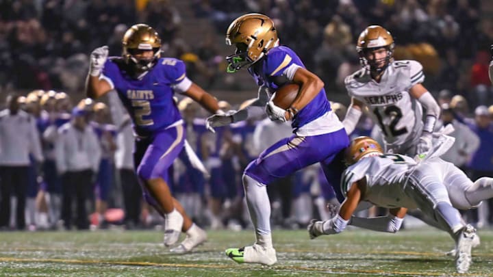 St. Augustine (purple) went from 2023 State Regional Division 1-A finalist — shown here in 21-20 loss to eventual state champion St. Bonaventure — to an 0-10 regular season in 2024, only to win the San Diego Section D3 championship on Saturday. 