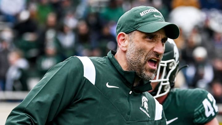 Michigan State's defensive coordinator Joe Rossi works with the linebackers during the Spring