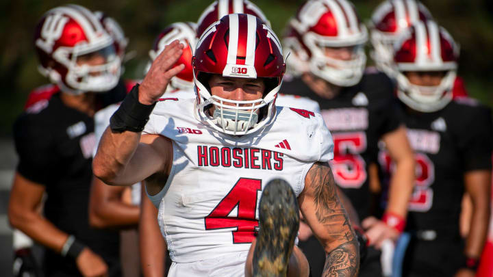 Indiana's Aiden Fisher (4) stretches during fall practice at Mellencamp Pavilion Tuesday, Aug. 6, 2024. Indiana's Aiden Fisher (4) stretches during fall practice at Mellencamp Pavilion Tuesday, Aug. 6, 2024.