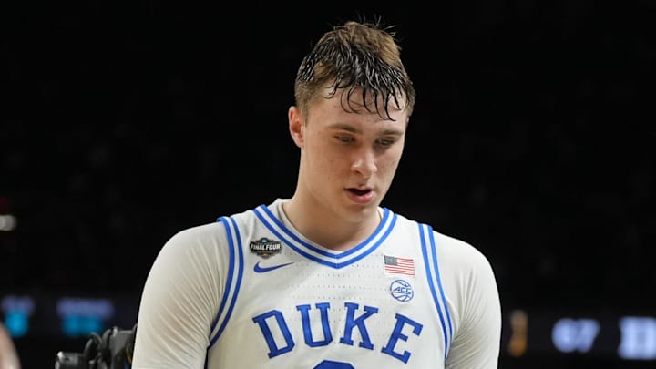 Apr 5, 2025; San Antonio, TX, USA; Duke Blue Devils forward Cooper Flagg (2) walks off the court after losing to the Houston Cougars in the semifinals of the men's Final Four of the 2025 NCAA Tournament at the Alamodome. Mandatory Credit: Robert Deutsch-Imagn Images