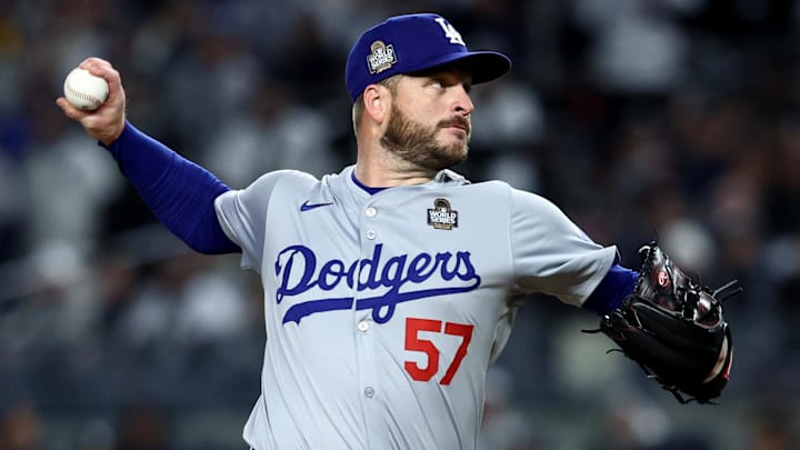 Oct 28, 2024; New York, New York, USA; Los Angeles Dodgers pitcher Ryan Brasier (57) throws during the eighth inning against the New York Yankees in game three of the 2024 MLB World Series at Yankee Stadium. Mandatory Credit: Wendell Cruz-Imagn Images
