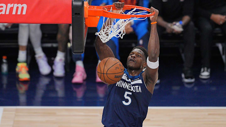 May 24, 2025; Minneapolis, Minnesota, USA; Minnesota Timberwolves guard Anthony Edwards (5) dunks the ball against the Oklahoma City Thunder during the first half in game three of the western conference finals for the 2025 NBA Playoffs at Target Center. Mandatory Credit: Brad Rempel-Imagn Images